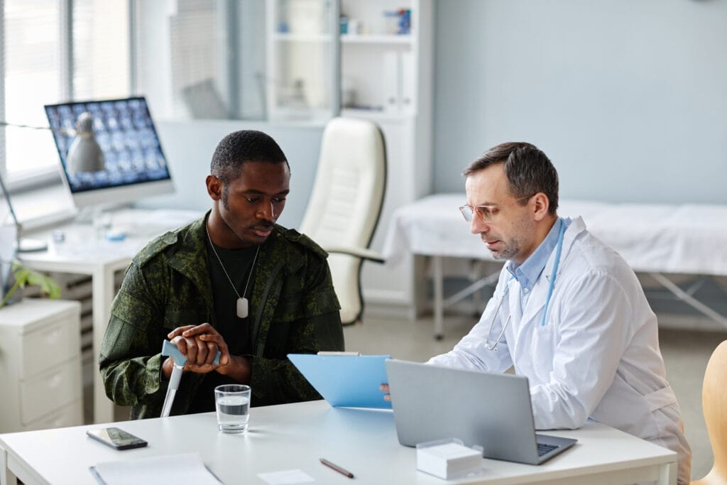 A doctor discusses Health Savings Accounts (HSAs) with a patient in a medical office.